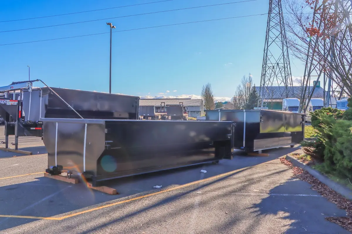 Roll-off dumpster ready for waste disposal at job site for 15 Yard Dumpster Rental in Dalton
